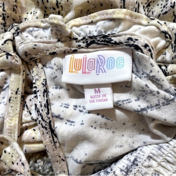 LuLaRoe "Clara" V-smocked blouse w ruffle collar & oversize puff sleeves. Size M - Picture 5 of 6